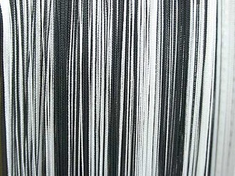 Черно-белая нитяная штора мелким оптом в Воронеже на складе. Работаем с регионами РФ