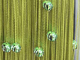 Салатово-зеленая нитяная шторка с шариками